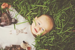 Baby on Grass. Photographer: Nadia Nova