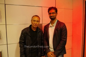 Me, standing with Director Hou Hsiao Hsien.
